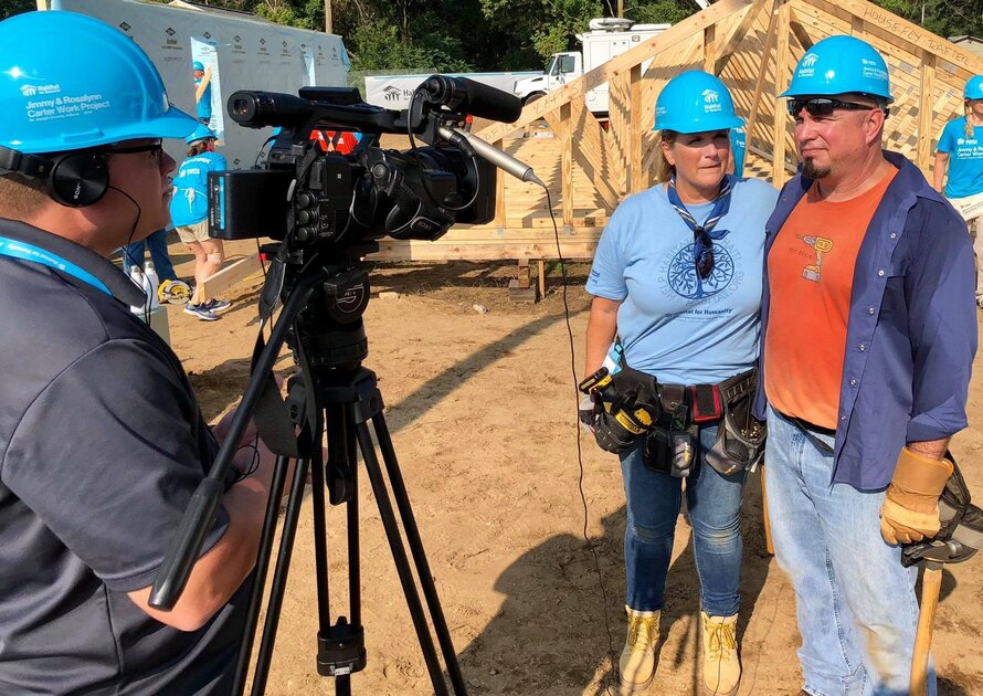 Kane Farabaugh's crew filming Garth Brooks and Trisha Yearwood at a Habitat for Humanity build