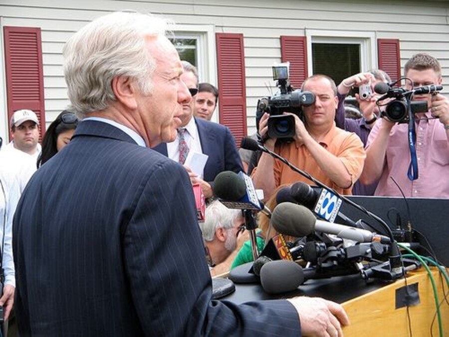 Camera crews covering a press conference