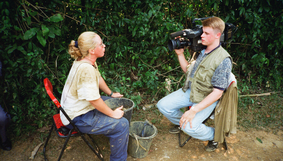 Kane Farabaugh's camera crew filming an interview in the field