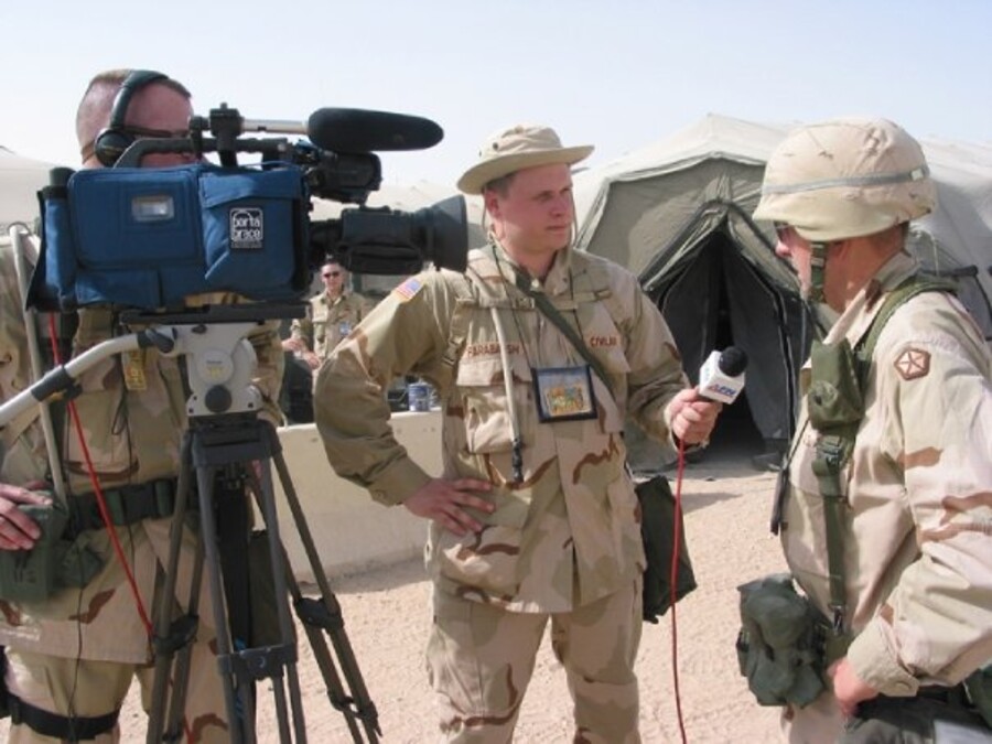 Kane Farabaugh interviewing US troops overseas