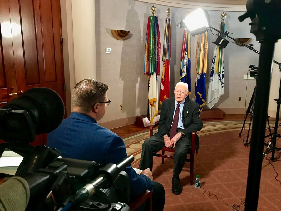 Kane Farabaugh filming an interview with President Jimmy Carter
